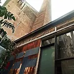 Beautiful House With Old Industrial Chimney